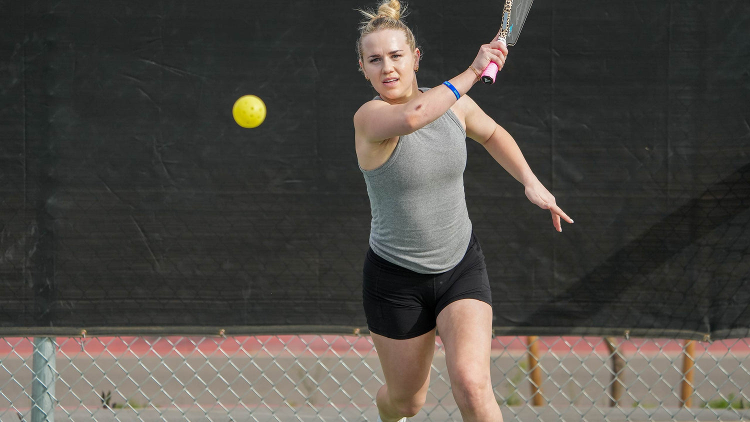 Young woman playing pickleball with UTR Sports Pickleball Amateur Series