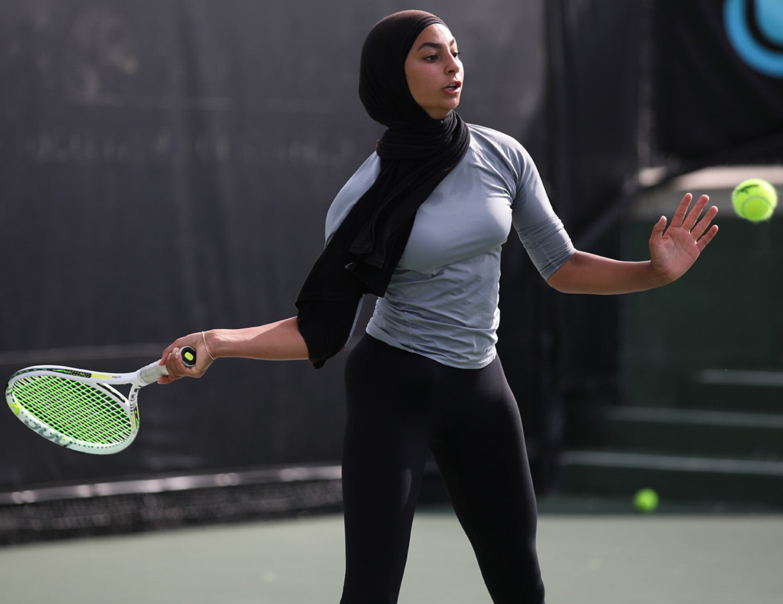Girl hits a forehand while being ranked in the high school girls tennis rankings by UTR Sports based on UTR Rating