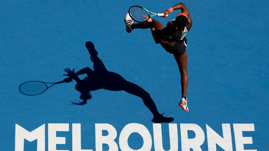 Coco Gauff hits a leaping forehand in Melbourne.