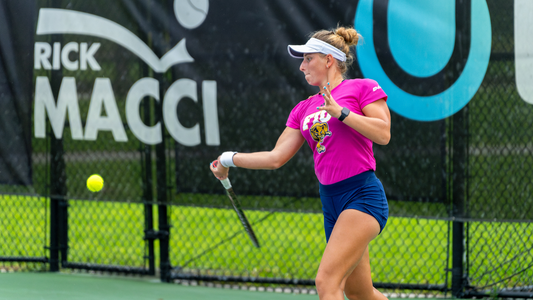 Ekaterina Khayrutdinova hits a slice forehand in Boca Raton, Fla. 