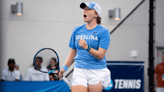 Reese Brantmeier celebrates a point on court.