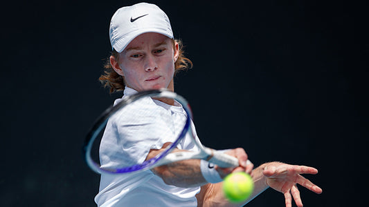 Aussie Dane Sweeny hits a forehand during a professional tennis match