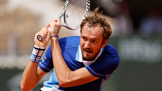 Medvedev and Swiatek March Onward as Cornet Keeps Home Hopes Alive