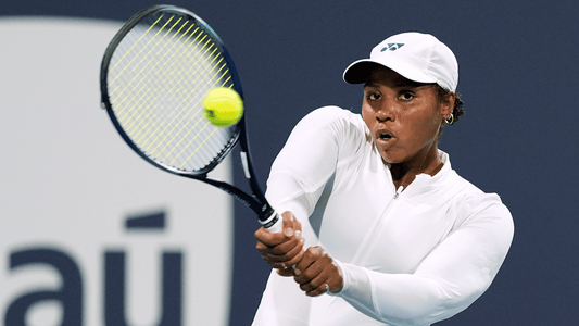Taylor Townsend hits a backhand. 