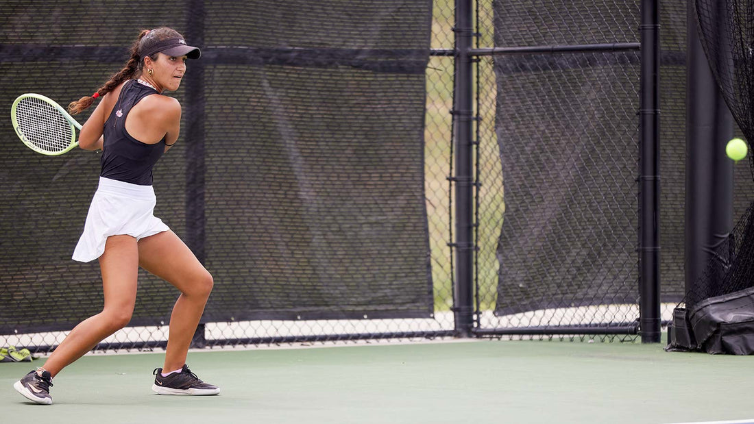 Woman with a UTR Rating prepares to hit a backhand at a UTR Pro Tennis Tour event in Denver, Colorado, USA